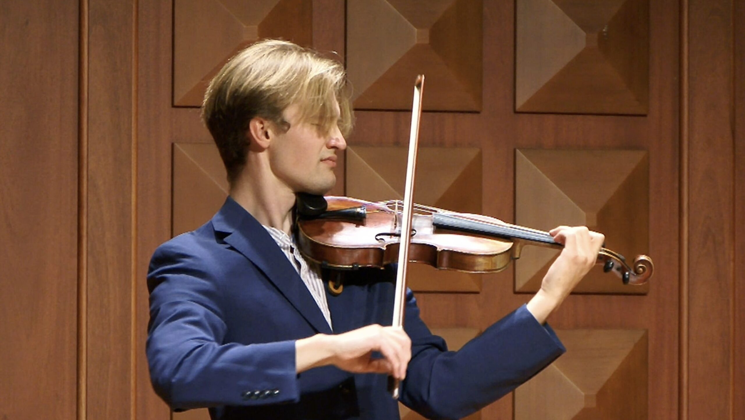 Beau Henson playing a violin